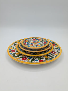 Juego de 4 platos Al-Khalil hechos a mano. en amarillo