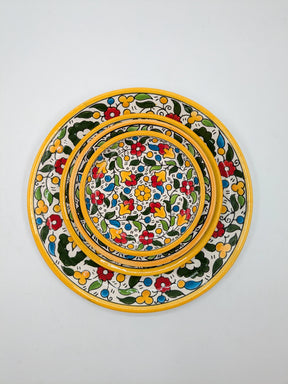Juego de 4 platos Al-Khalil hechos a mano. en amarillo