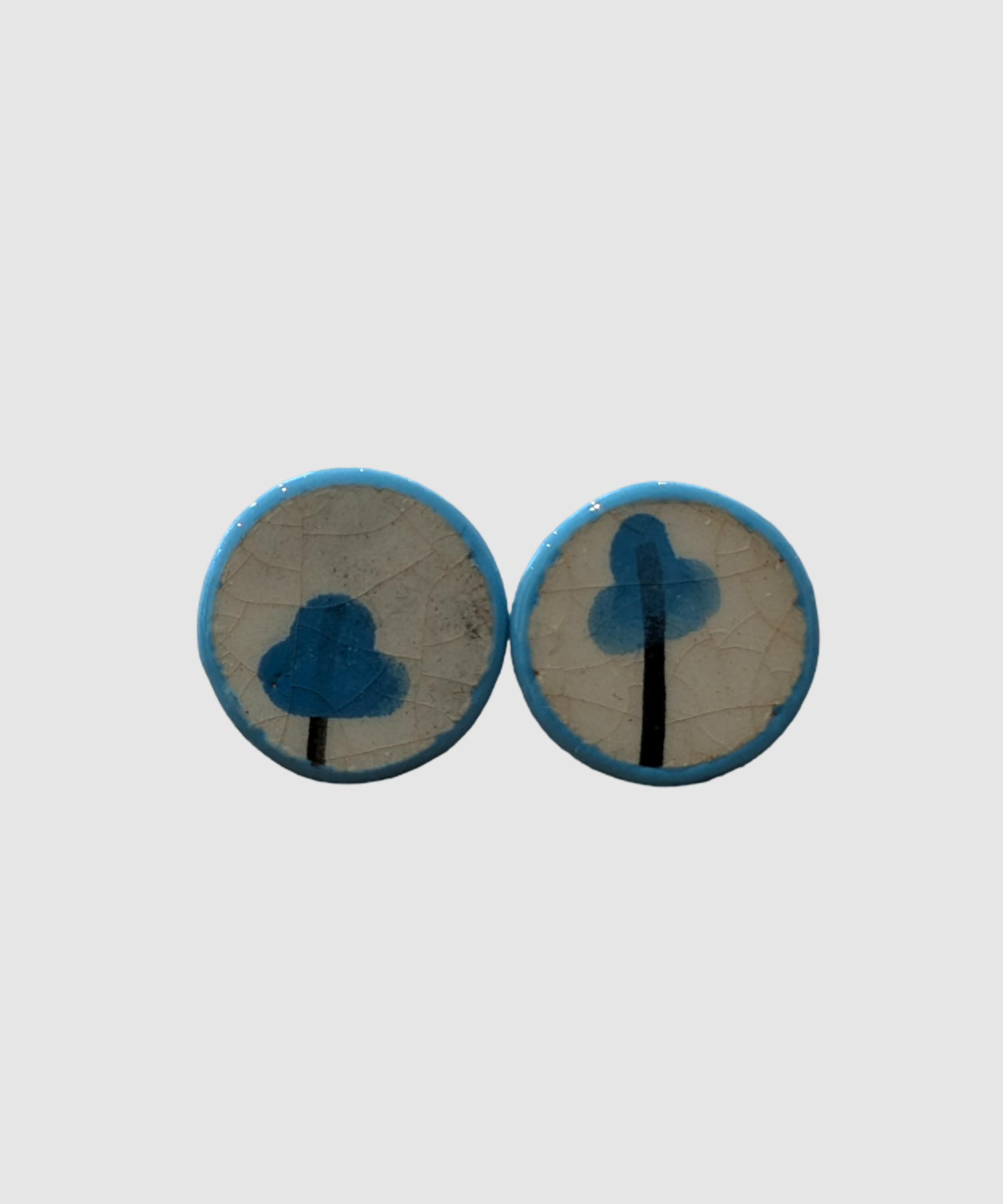 Handmade earrings made of Palestinian ceramics - Å